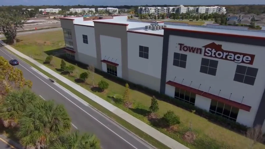 Aerial view of the Town Storage building and its sign along the street in Winter Springs.